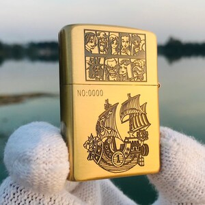 通販 クリスマスセール2024: 特集 Zippo One Rare Engaraved Golden Luffy D Monkey Boat Piece その他