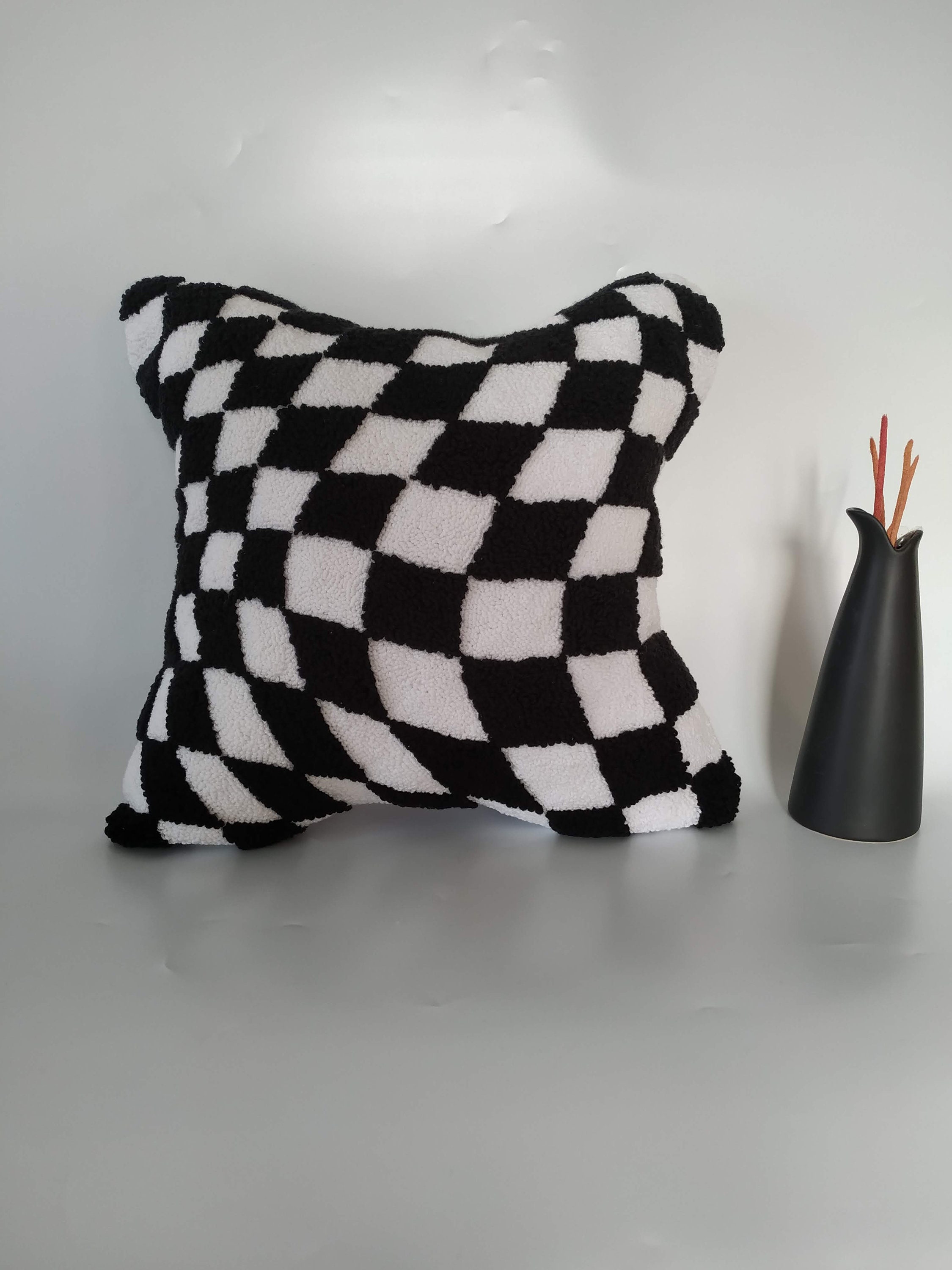 Black and white top checked throw pillows