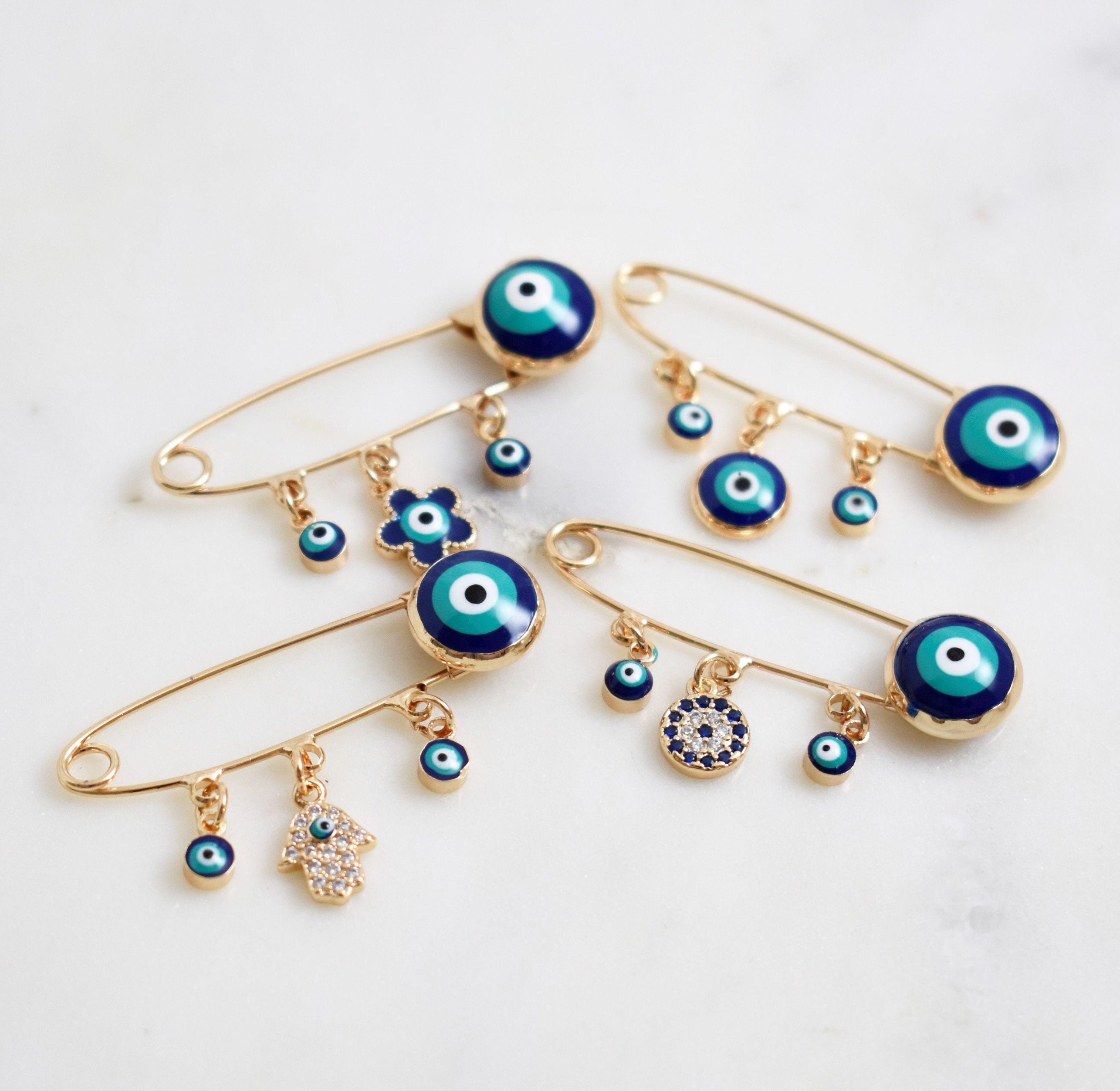 thumbnail interactive-video image 1 of Turkey Evil Eye Brooch Pins - Blue Lucky Charm Lapel Pins 3-Pack 1 of 10