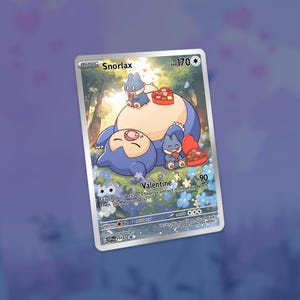 May include: A Valentine's Day themed trading card featuring Snorlax. The card shows a large, sleeping Snorlax with smaller creatures and heart-shaped boxes of chocolates. The card has the text "Snorlax" and "Valentine".