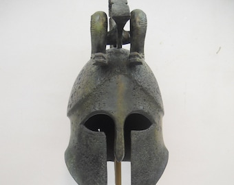 Hi Jean Philip. This helmet is beautiful !Handmade Bronze Spartan Helmet with Snakes: Greek Art on Granite Base