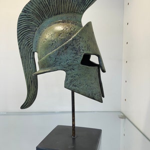 Spartan bronze helmet.Leonidas the King of Sparta just like the 300. Handmade in Greece with ancient lost wax technique. Patina to look old.