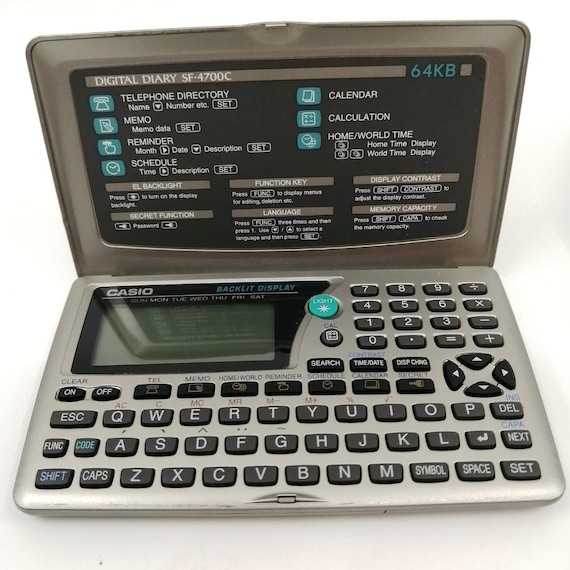 Casio Databank SF- 4700C Pocket Size Retro Databank Mini Pc 1990
