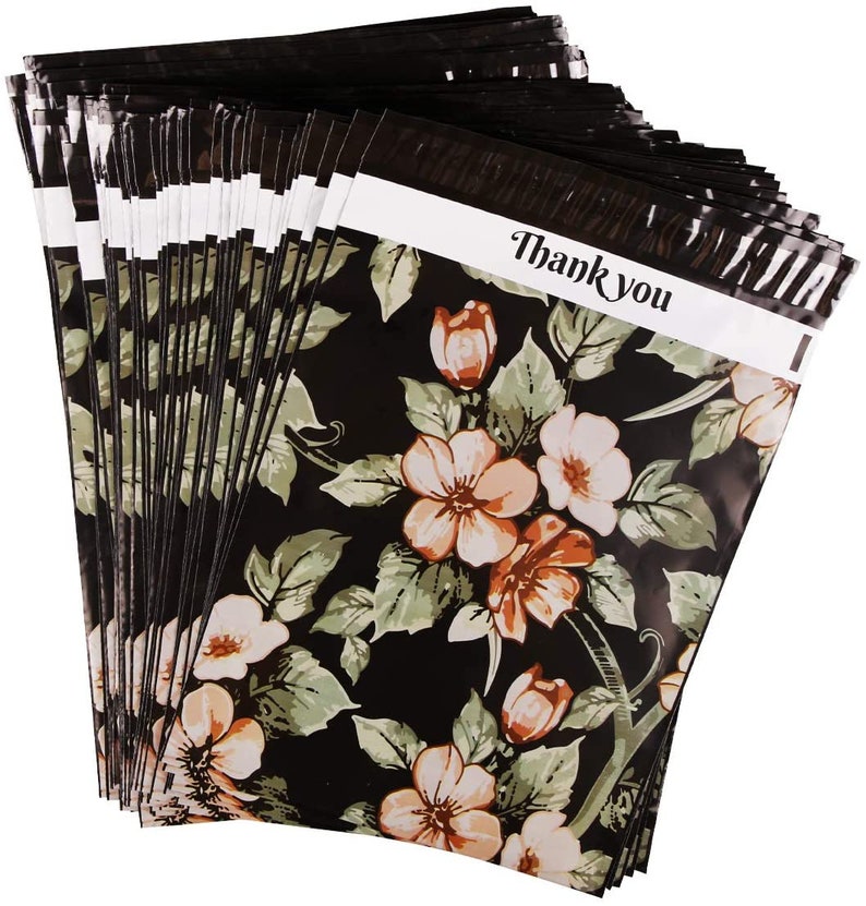 May include: A stack of black poly mailers with a floral pattern and a white label that says "Thank You".