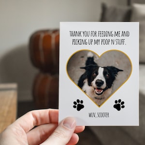 May include: A white card with a black and white dog photo in a gold heart-shaped frame. The card says "THANK YOU FOR FEEDING ME AND PICKING UP MY POOP N STUFF." and "WUV, SCOOTER" with two black paw prints.