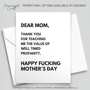 May include: A white greeting card with black text inside a white envelope. The card reads "DEAR MOM, THANK YOU FOR TEACHING ME THE VALUE OF WELL TIMED PROFANITY. HAPPY FUCKING MOTHER'S DAY."