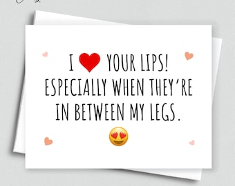 May include: A white greeting card with the text "I ❤️ YOUR LIPS! ESPECIALLY WHEN THEY'RE IN BETWEEN MY LEGS." in black font. A red heart and emoji with heart eyes are also featured. Small pink hearts are scattered around the text.
