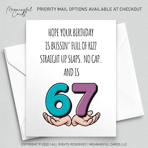 May include: A white greeting card with the text "HOPE YOUR BIRTHDAY IS BUSSIN' FULL OF RIZZ STRAIGHT UP SLAPS. NO CAP. AND IS" and the number 67 in teal and purple. The card is inside a white envelope.