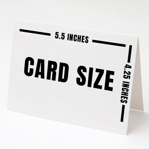 May include: A white card with the text "CARD SIZE" in bold black letters. The card is 5.5 inches wide and 4.25 inches tall. The card is folded in half and stands upright.