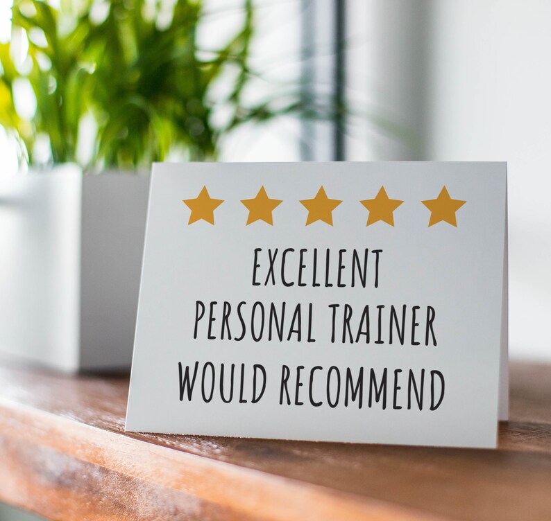May include: White card with five gold stars and the text "EXCELLENT PERSONAL TRAINER WOULD RECOMMEND".