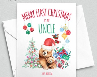 May include: A white greeting card with a watercolor illustration of two bears wearing Santa hats, a Christmas tree, and presents. The card reads "MERRY FIRST CHRISTMAS AS MY UNCLE" in red and green text. The card is inside a white envelope.