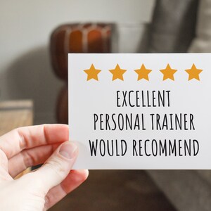 May include: White card with five gold stars and the text "Excellent Personal Trainer Would Recommend".