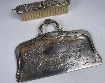 Garbage Collector from the late 1800 in silver.