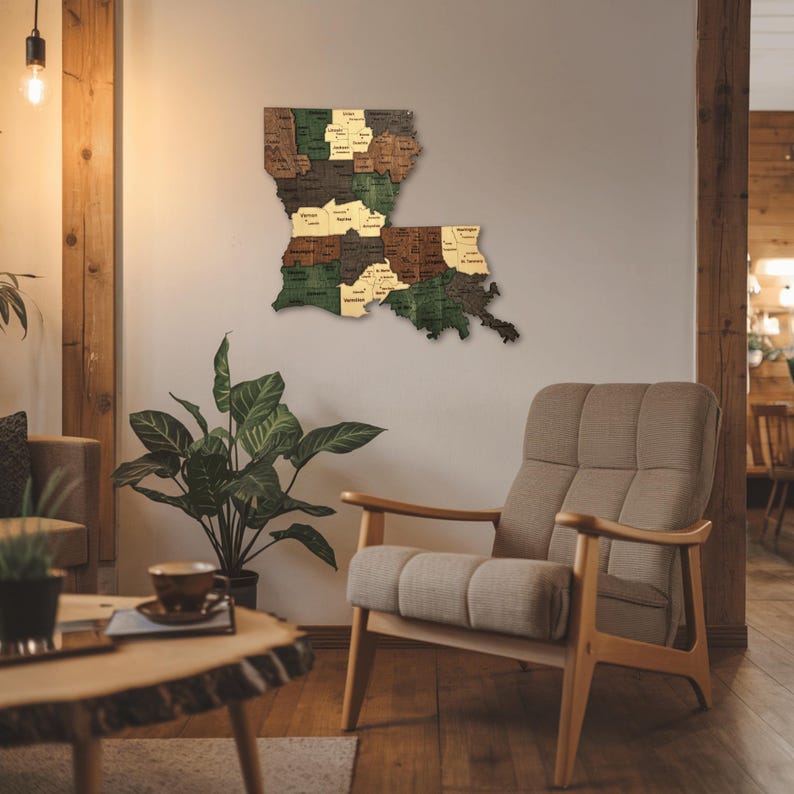 May include: A wooden map of Louisiana, mounted on a wall. The map is composed of various shades of brown, green, and tan, with each parish outlined and labeled. The map is a decorative piece, adding a touch of rustic charm to the room.