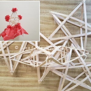 May include: A set of five unfinished wooden star-shaped lanterns. The lanterns are made of thin wooden sticks and are tied together with string. The lanterns are stacked on top of each other.