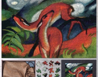 May include: A jigsaw puzzle featuring a painting of two red deer in a forest setting. The deer are in a dynamic pose, with one leaping over the other. The background is a vibrant mix of green, blue, and white, with hints of clouds and foliage.