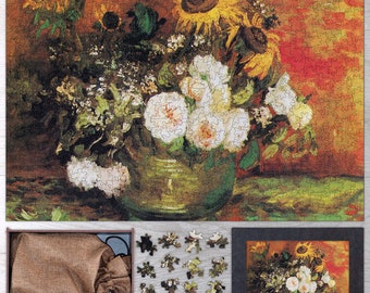 May include: A still life painting of a vase filled with white roses and sunflowers. The vase is green and sits on a table with a green tablecloth. The background is a warm orange color.
