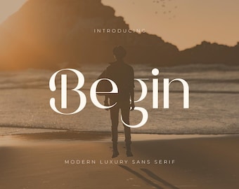 May include: A person's silhouette stands on a beach, with the word "Begin" in large, elegant white letters. The text "Introducing" and "Modern Luxury Sans Serif" are also present. The background shows a sunset over the sea.