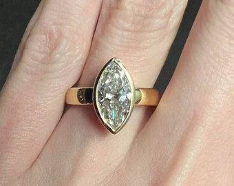 Marquise Cut 1ct Moissanite Engagement Ring: 18k Gold Bezel Set