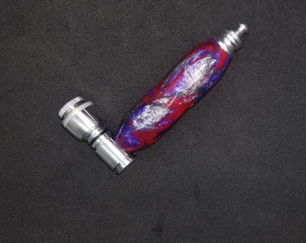 red, purple and silver smoking pipe