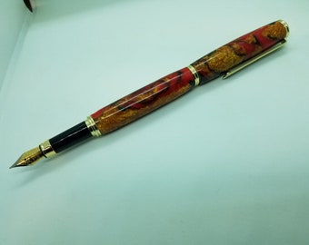 Fountain pen in red black and gold