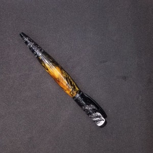 black and gold moon phase pen