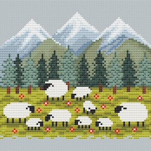 May include: A cross-stitch design featuring a pastoral scene with white sheep grazing in a green meadow dotted with red flowers. Behind them are green pine trees, snow-capped mountains, and a light blue sky.