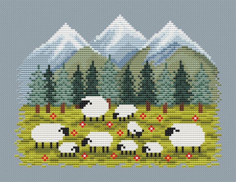 May include: Cross-stitch design featuring a pastoral scene. White sheep with black faces graze in a green meadow dotted with red flowers. Behind them are green pine trees and snow-capped mountains, all against a light blue background.