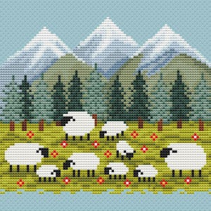 May include: A cross-stitch design featuring a pastoral scene with white sheep grazing in a green meadow dotted with red flowers. Behind the sheep are green trees and snow-capped mountains, all set against a light blue background.