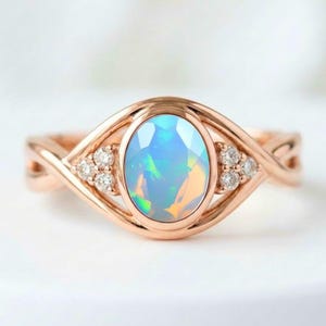 Oval Ethiopian Opal Ring, Rose Gold Vermeil, Infinity Twist Band, Moissanite Accents