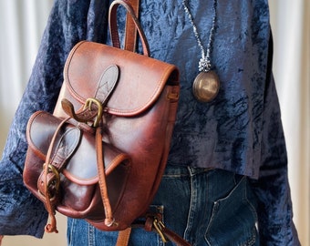 Vintage Y2K Robert Cheau Cognac Brown thick cowhide mini backpack sling bag made in NYC