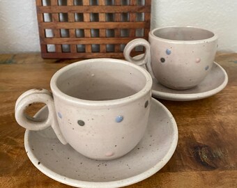 Vintage stoneware handmade set cream with Polka dots pattern tea cups with saucers
