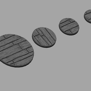 May include: Four round wooden bases with a plank design, ranging in size from small to large.