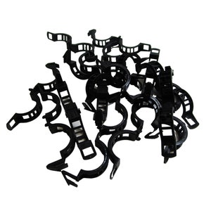 May include: A pile of black plastic plant supports, designed to help plants grow upright. These supports are ideal for use in gardens, greenhouses, and other growing environments.