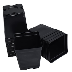 May include: A stack of black plastic square plant pots. The pots are 4 inches in size and are ideal for starting seeds or transplanting small plants.