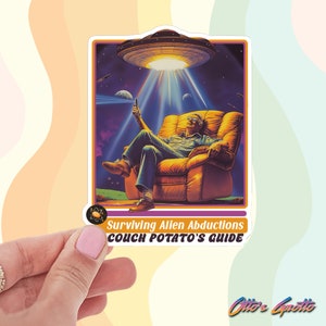 May include: A sticker with a retro illustration of a man relaxing in a recliner with a UFO hovering above him. The text reads "Surviving Alien Abductions Couch Potato's Guide".