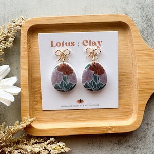 Polymer clay easter egg earrings, spring clay earrings, floral clay earrings, spring floral earrings, cute Easter hoop earrings, bow studs