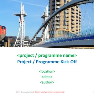 May include: A presentation slide with a city skyline background featuring a bridge and modern buildings. The text on the slide reads "<project/programme name> Project/Programme Kick-Off" followed by "<location> <date> <author>".