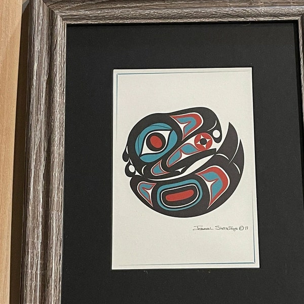 Native American Alaskan Tlingit Nation Master/ Artist/Carver Israel Shortridge Tlingit Eagle Formline 5x7 Print Matted in a gray wood frame.