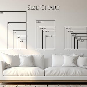 a white couch sitting in front of a white wall