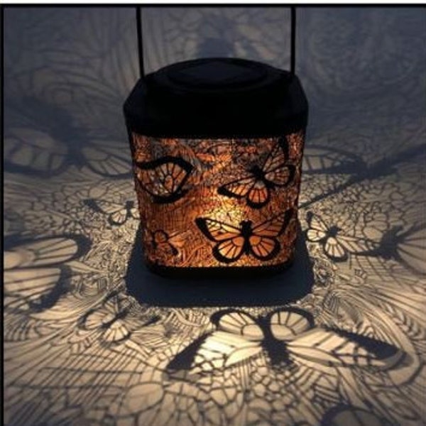 2 Solar Lanterns. Decorative Lantern, Butterfly or Dragonfly design. Delicate light illuminates the surrounding area. Outdoor Lantern, Solar