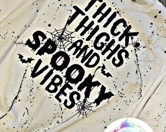 Thick thighs and spooky vibes paint splatter sweatshirt