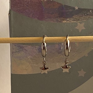 Gold and silver star charm hoop earrings