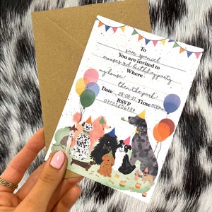 May include: A colorful birthday party invitation with a cartoon illustration of dogs wearing party hats and holding balloons. The text on the invitation reads "To Sam Spaniel You are invited to Moose's 3rd Birthday Party my house! then the park! Date 28-08-21 Time 11:00 RSVP 07123456789"