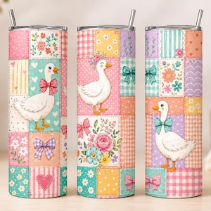May include: Three cylindrical metal tumblers with lids and straws, featuring a patchwork design of pastel squares. The pattern includes white ducks wearing bows, floral arrangements, hearts, and gingham prints in shades of pink, yellow, and teal.