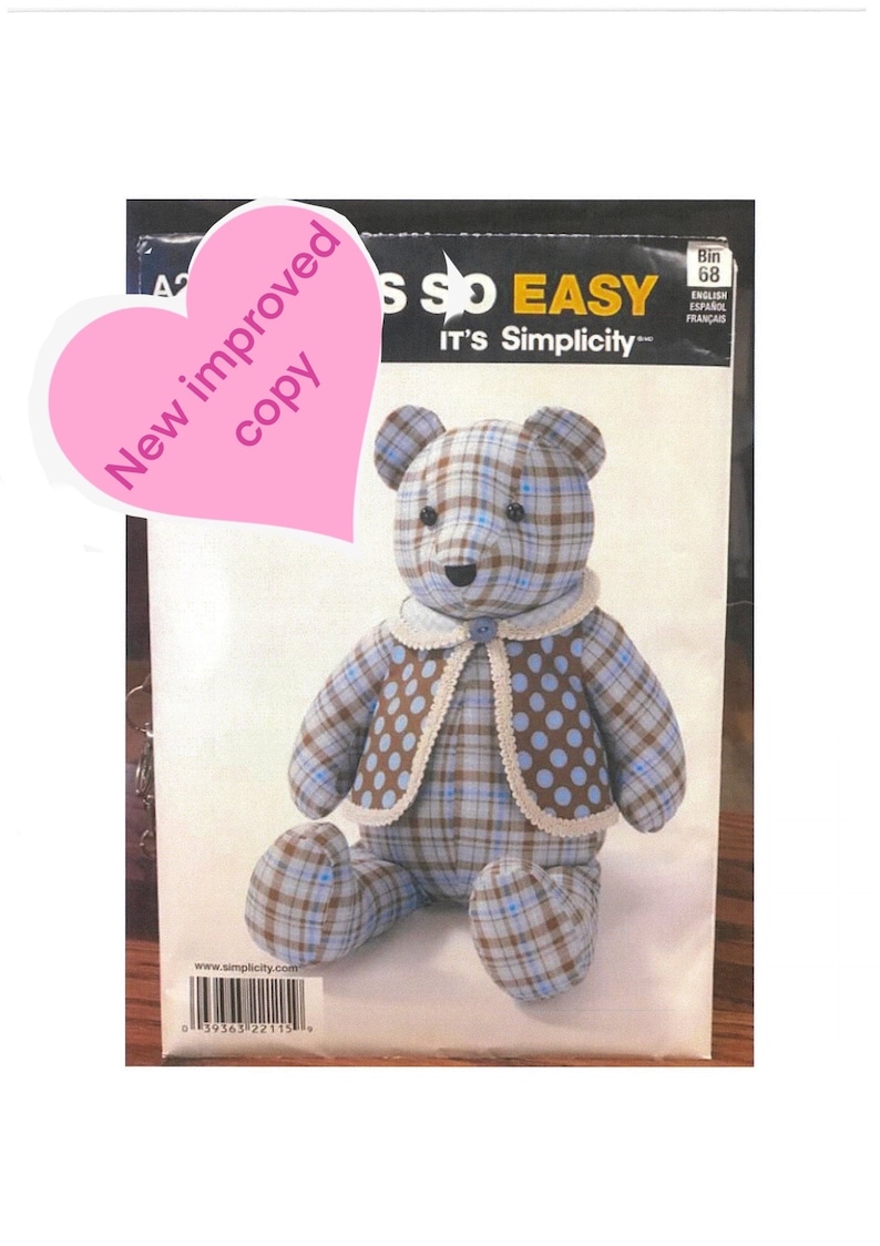 May include: A sewing pattern for a plaid teddy bear with a brown and blue polka dot waistcoat. The pattern is titled "It's Simplicity" and is labelled "New Improved Copy".