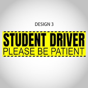 May include: A rectangular yellow sign with black text that reads "STUDENT DRIVER PLEASE BE PATIENT." The sign has a black and yellow striped border and the text "DESIGN 3" at the top.