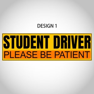 May include: A rectangular yellow sign with black text that reads "STUDENT DRIVER PLEASE BE PATIENT." The text is centered and in a bold, sans-serif font. The words "PLEASE BE PATIENT" are in a smaller orange rectangle.