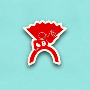 Könnte beinhalten: Ein roter und weißer Aufkleber mit einer stilisierten Figur mit einem fächerförmigen Element über dem Kopf und einer Hand, die eine Stoppgeste ausführt. Die Figur hat ein weißes "B" auf dem Torso, vor einem hellblauen Hintergrund.