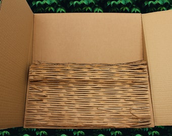 Cartón triturado: relleno y amortiguación para embalajes. Reciclado, reutilizado y biodegradable. La mejor opción de embalaje ecológico.